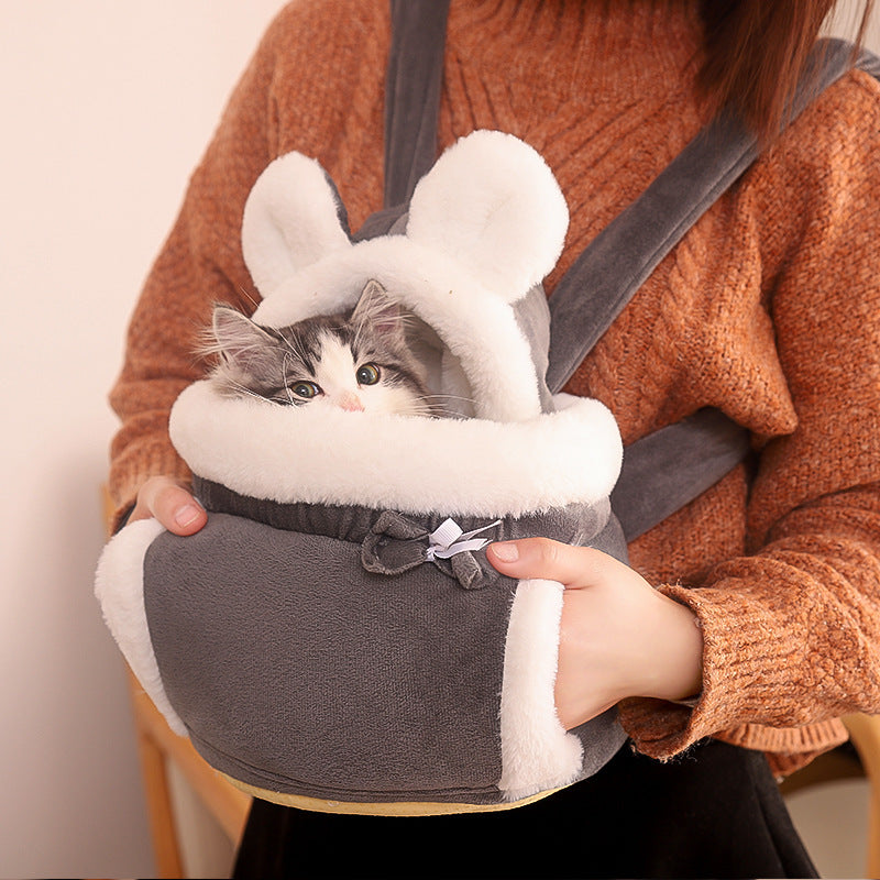 Bonita mochila para gatos y cama de interior